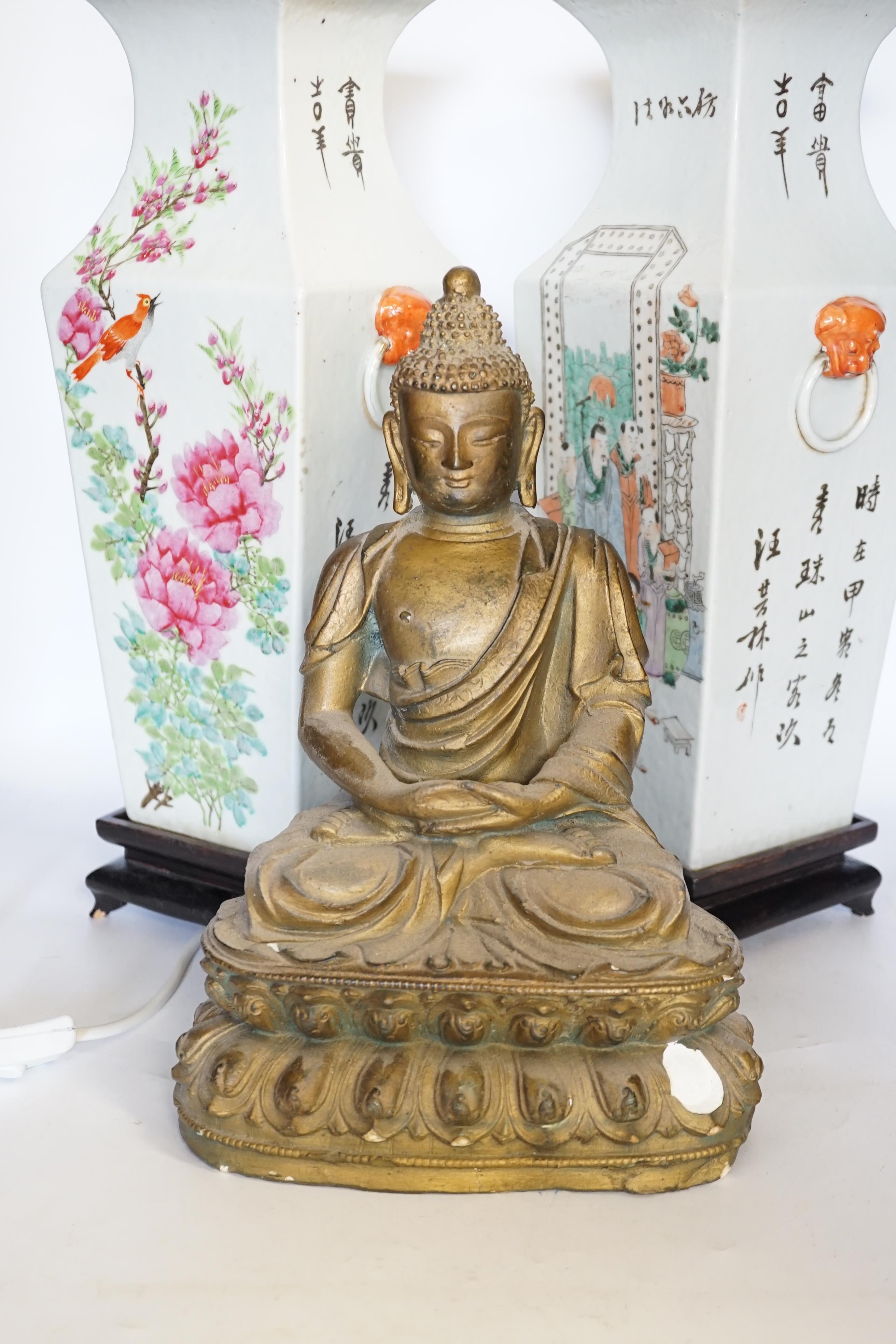 A pair of early 20th century Chinese famille rose vases, mounted as lamps and a plaster model of a Buddha, vases 46cm